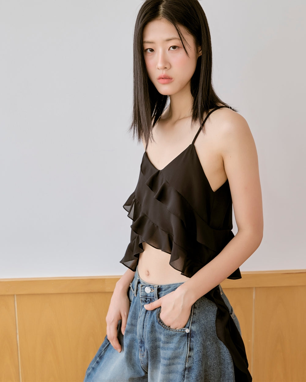 whimsical ruffle sleeveless blouse