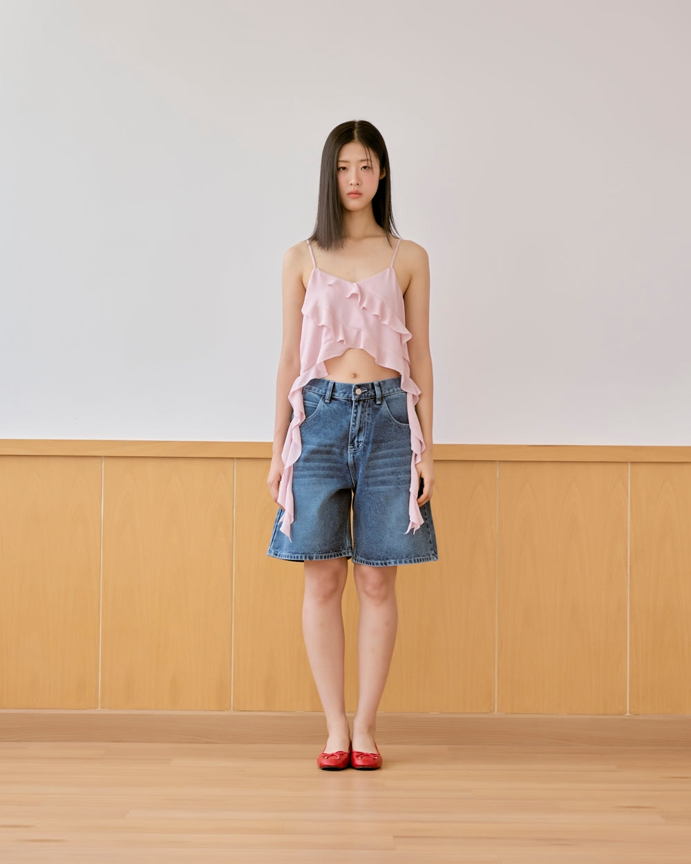whimsical ruffle sleeveless blouse